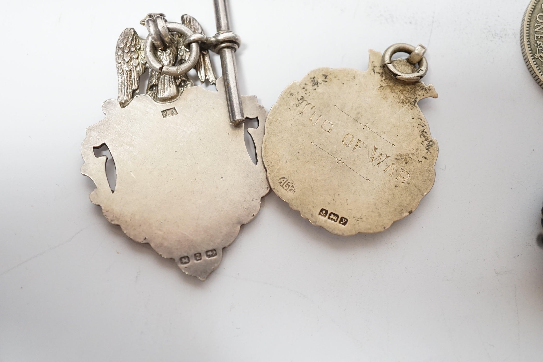 A pair of engine turned 9ct gold cufflinks, a yellow metal and enamel bar brooch, a white metal mounted citrine brooch, two silver medallions and two George V coins.